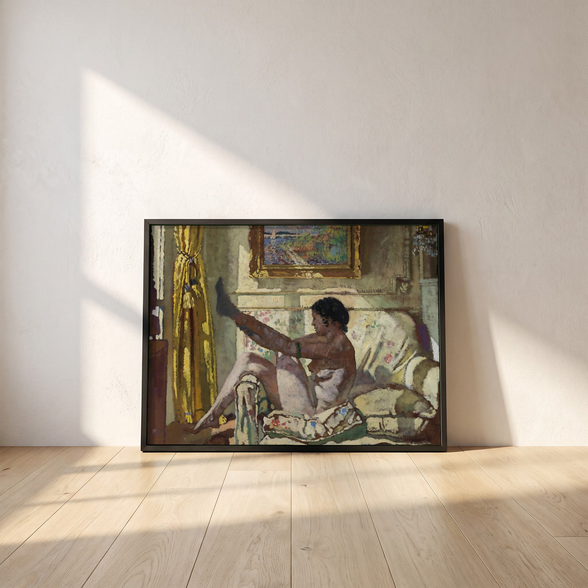 Sunlight framed print in a black frame leaning against a white plaster wall on oak floorboards in morning light