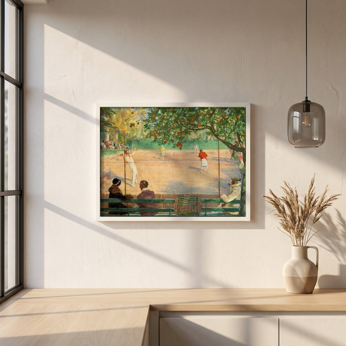 Sir John Lavery framed print in a white frame on a plaster wall above an oak worktop in a bright Scandinavian kitchen