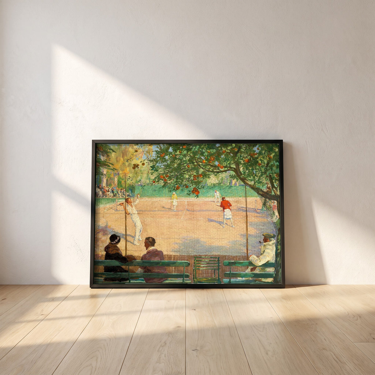 Sir John Lavery framed print in a black frame leaning against a white plaster wall on oak floorboards in morning light