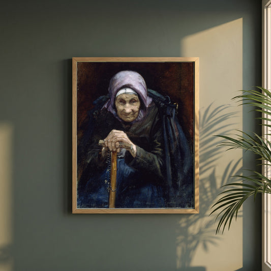 The Fisherman's Mother framed print in a natural oak frame on a dark green wall beside a window, dappled plant shadow