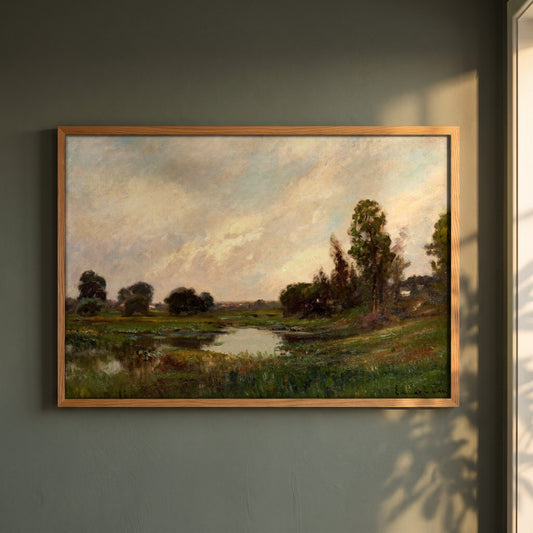 The River by Edward Gay framed print in a natural oak frame on a dark green wall beside a window, dappled plant shadow