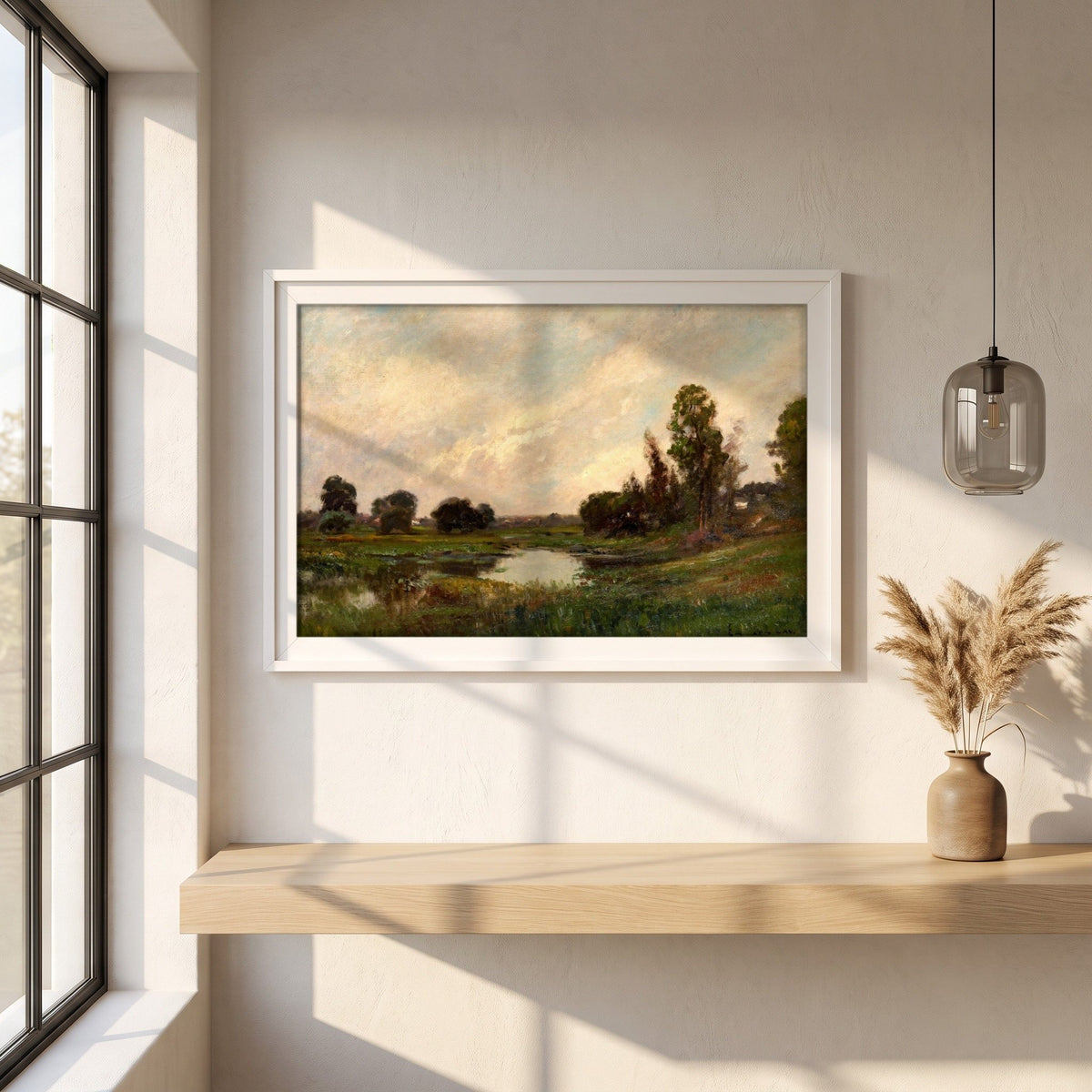 The River by Edward Gay framed print in a white frame on a plaster wall above an oak worktop in a bright Scandinavian kitchen