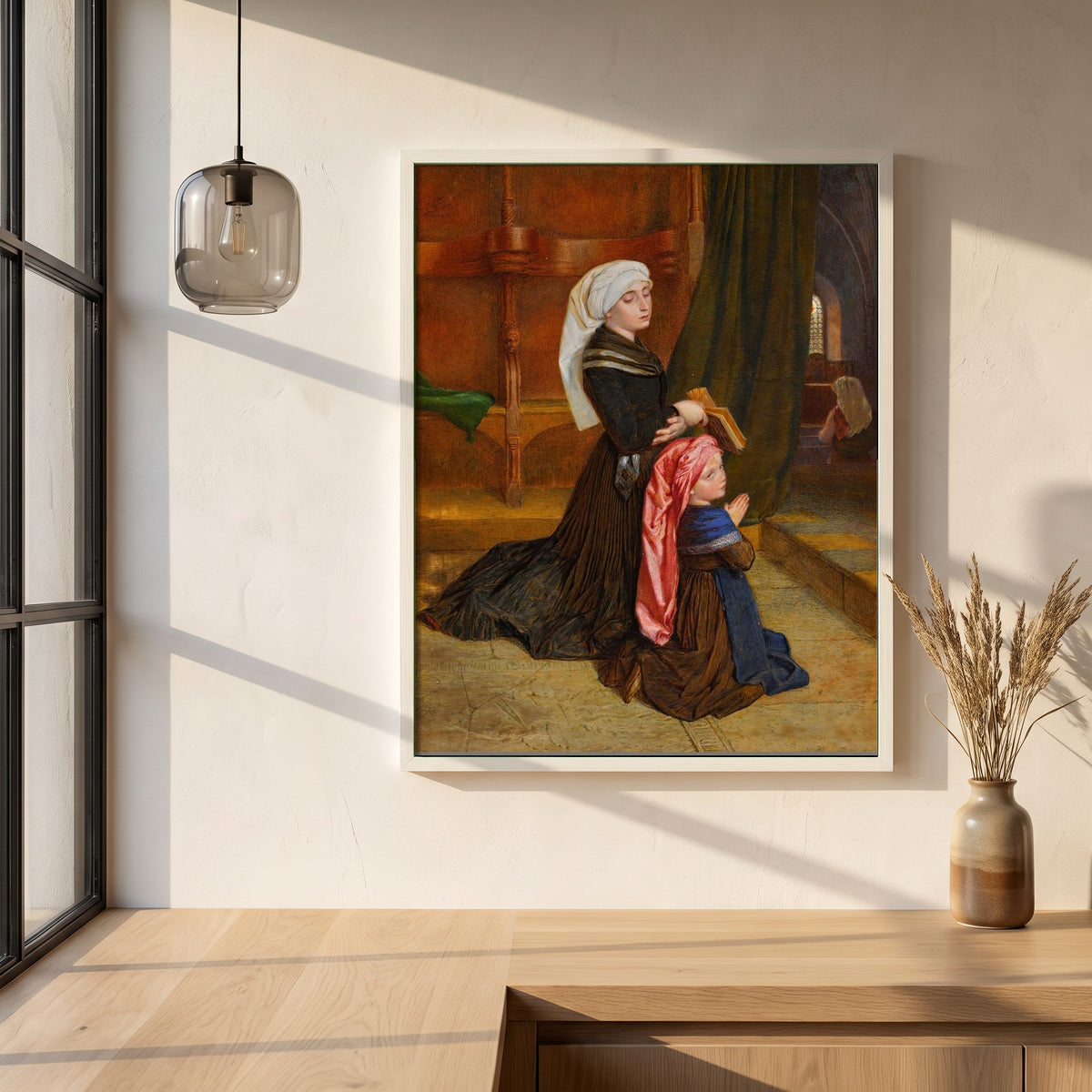 The Widow of Wöhlm framed print in a white frame on a plaster wall above an oak worktop in a bright Scandinavian kitchen