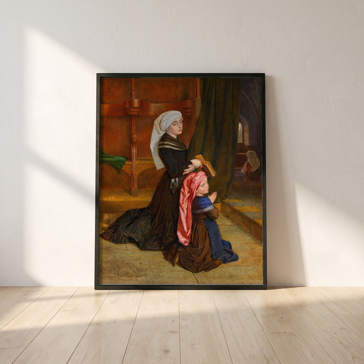 The Widow of Wöhlm framed print in a black frame leaning against a white plaster wall on oak floorboards in morning light