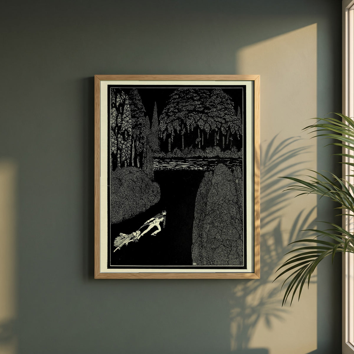 Toilsome Journey framed print in a natural oak frame on a dark green wall beside a window, dappled plant shadow