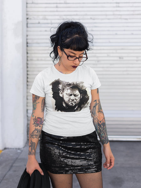 Shane MacGowan T-Shirt featuring a bold portrait of the Irish folk music legend, capturing his iconic presence with a vintage vibe and rock 'n' roll flair.