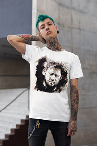 Shane MacGowan T-Shirt featuring a bold portrait of the Irish folk music legend, capturing his iconic presence with a vintage vibe and rock 'n' roll flair.